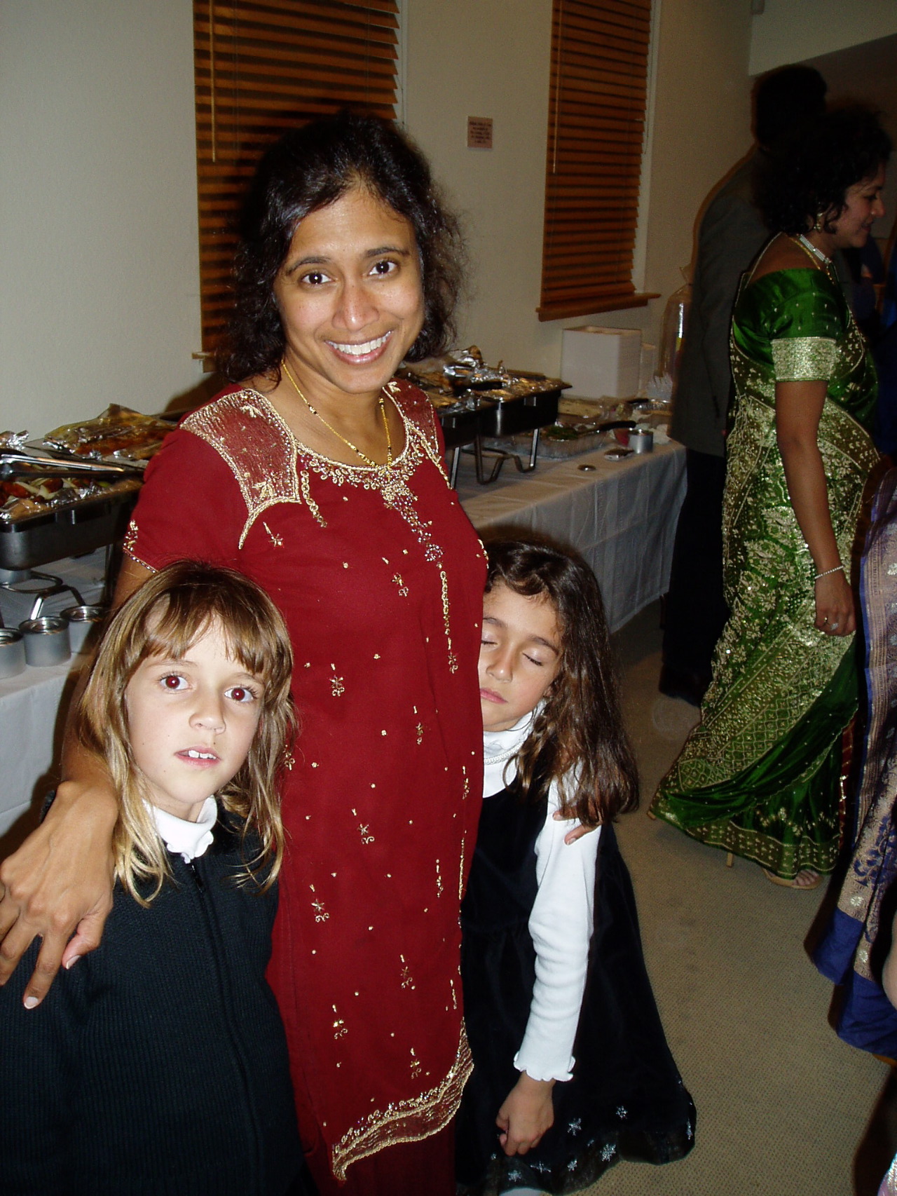 Nice sari in the background!